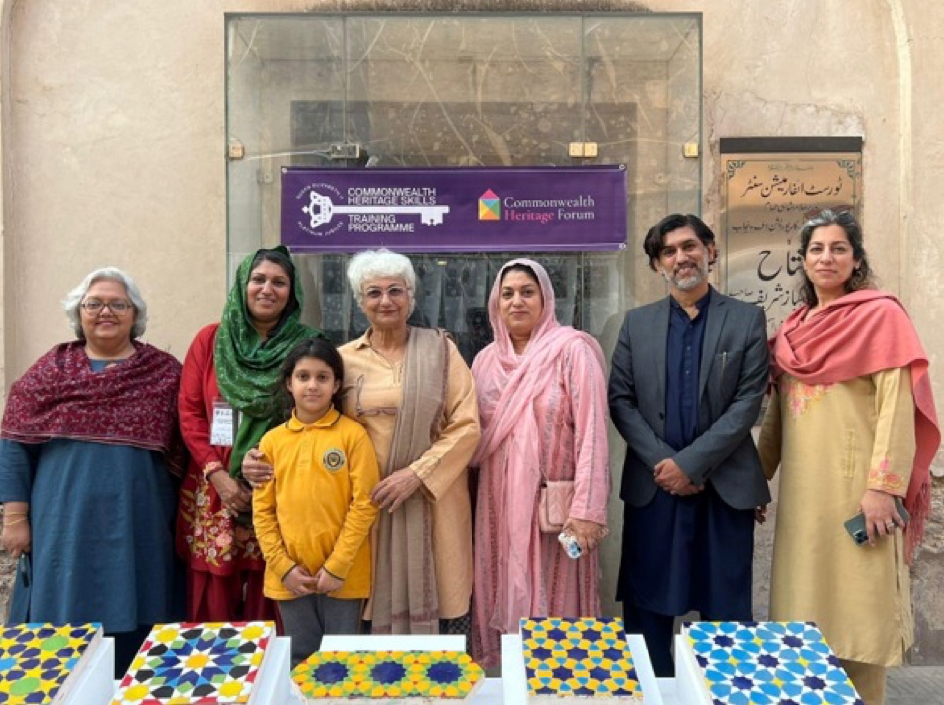 Closing ceremony of the conservation workshop at Lahore Fort with certificate distributions, documentary screening, and exhibition viewing — attended by officials, artists, and CROMLahore members.