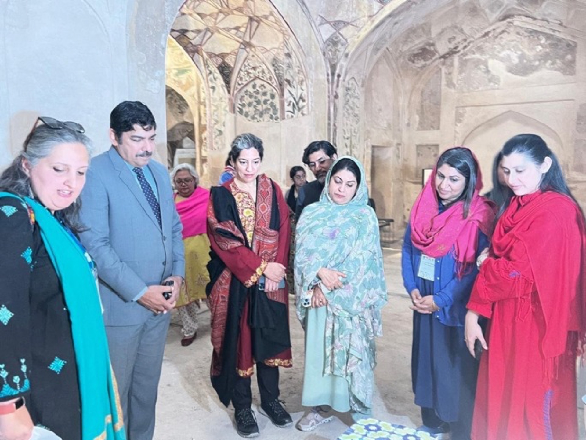 Closing ceremony of the conservation workshop at Lahore Fort with certificate distributions, documentary screening, and exhibition viewing — attended by officials, artists, and CROMLahore members.
