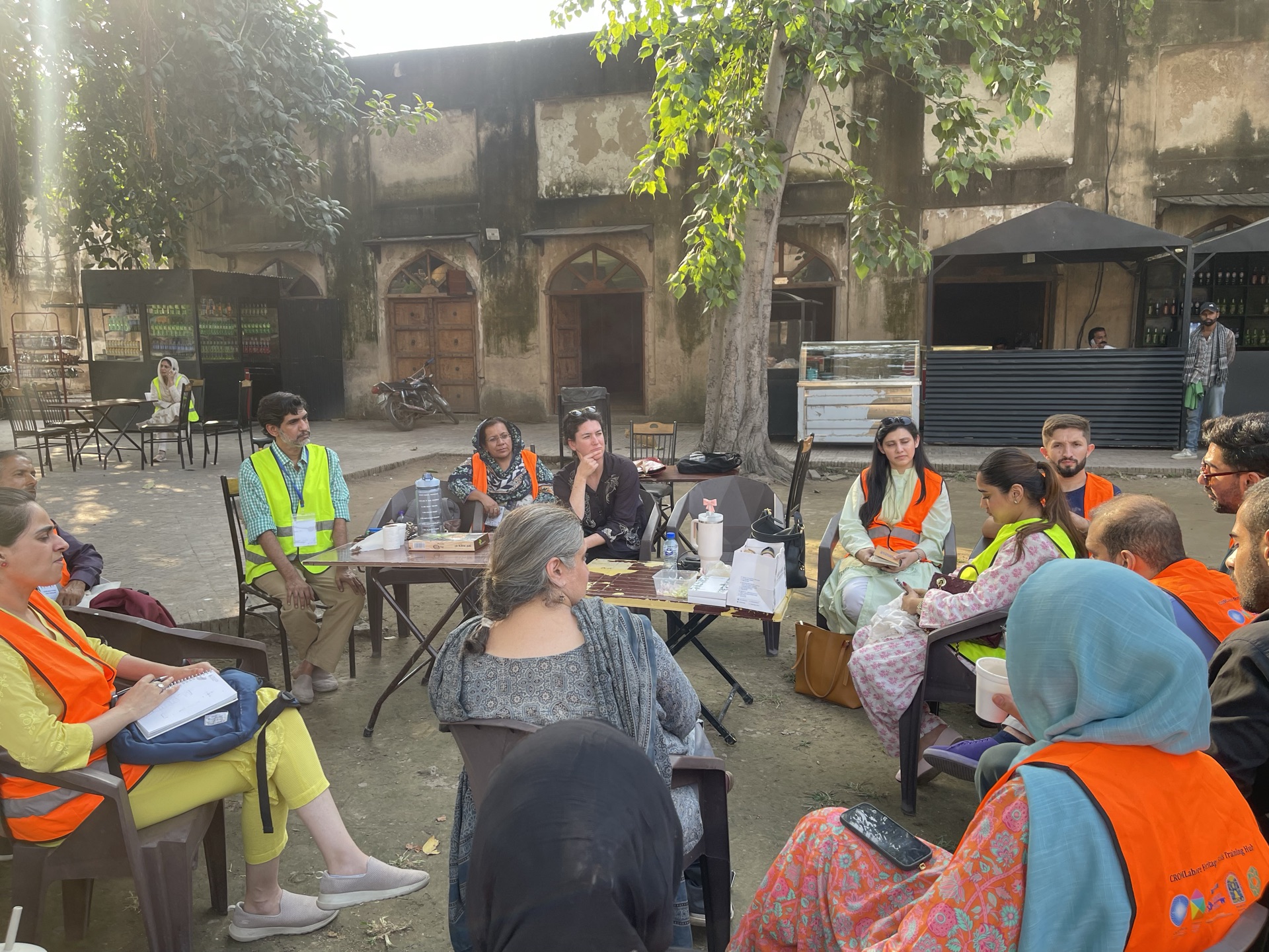 Fresco conservation training at Lahore Fort: site assessment, condition mapping, and group presentations across three historic structures.