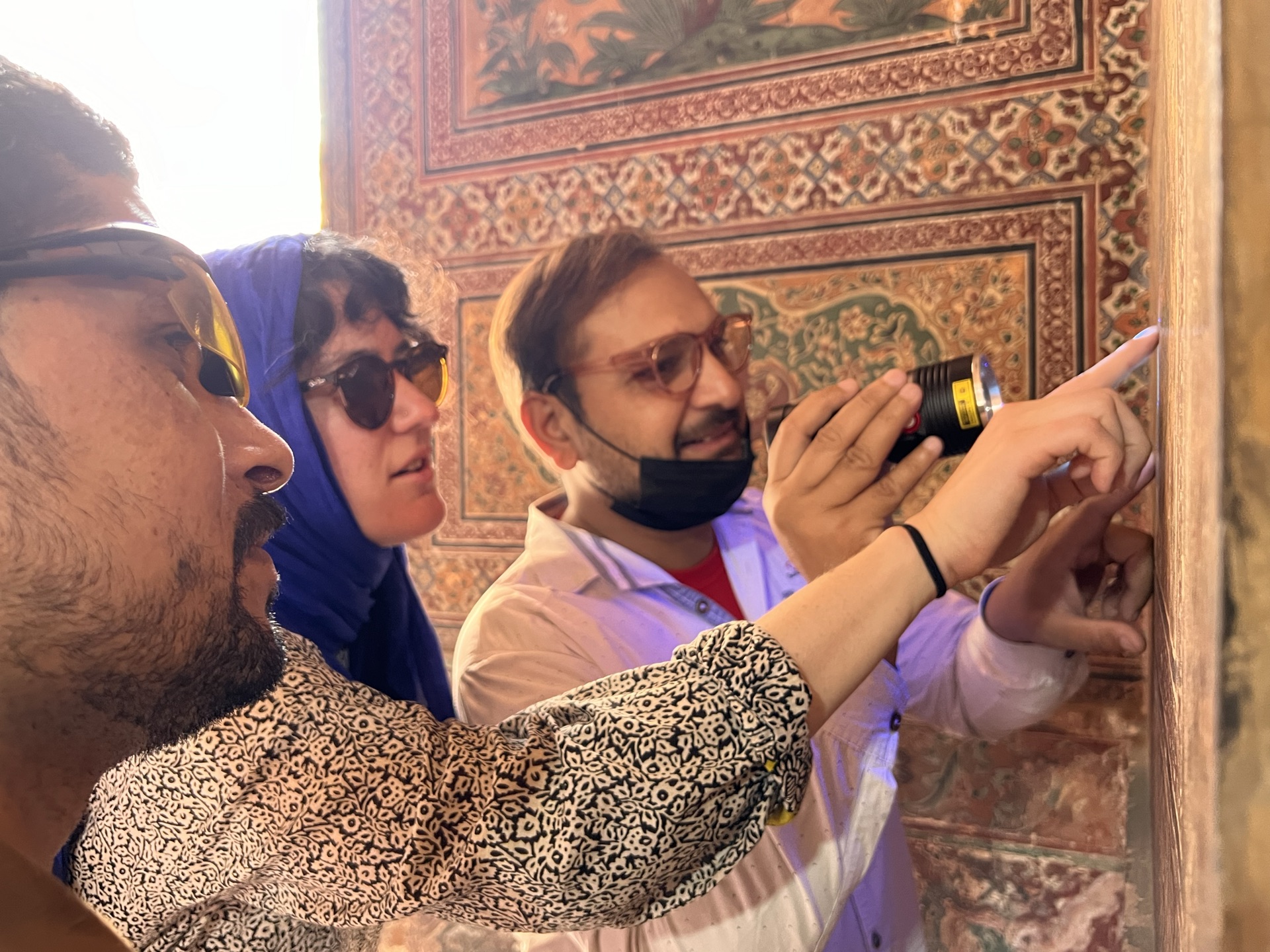 Fresco conservation training at Lahore Fort: site assessment, condition mapping, and group presentations across three historic structures.