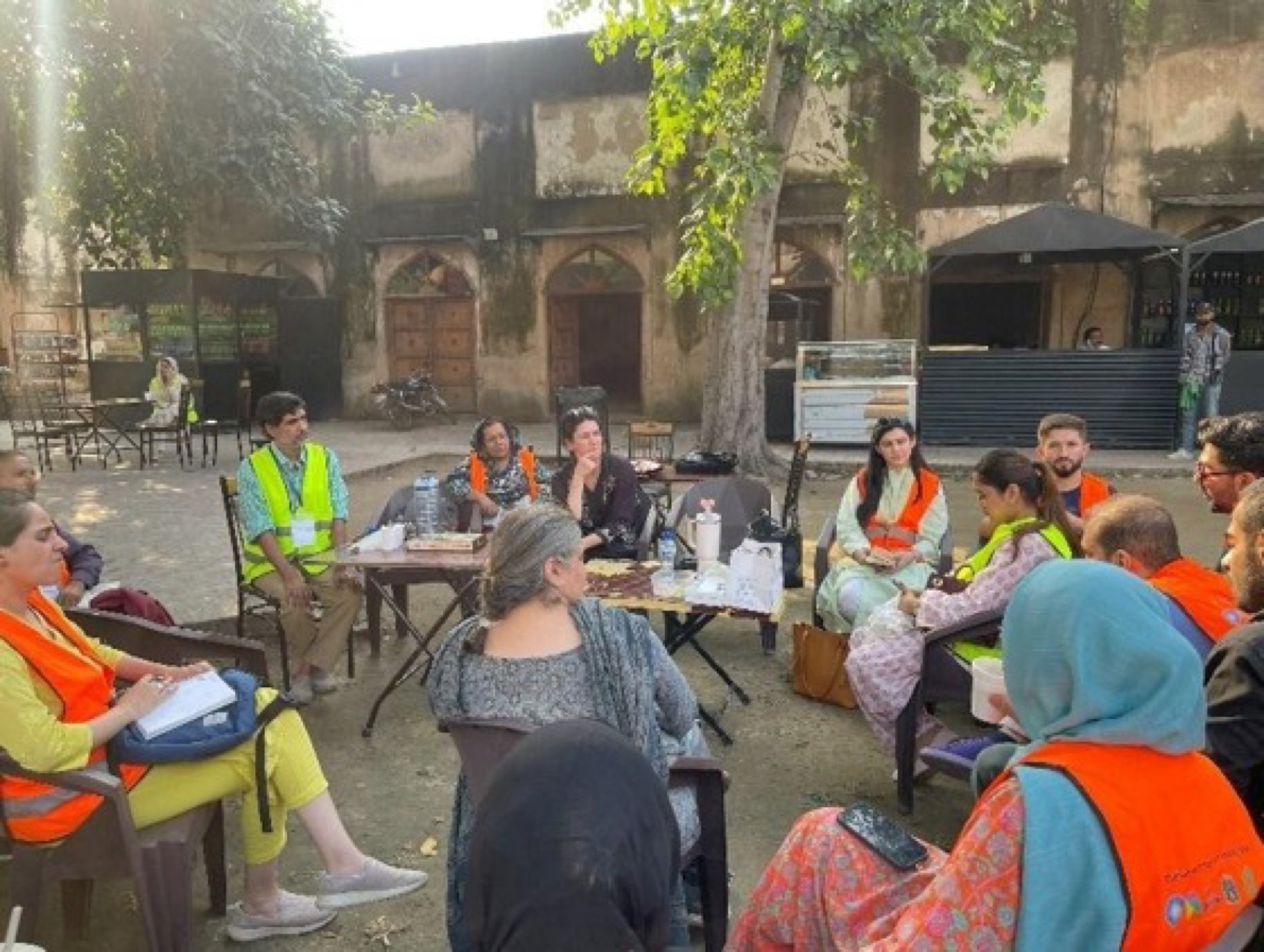 Fresco conservation training at Lahore Fort: site assessment, condition mapping, and group presentations across three historic structures.