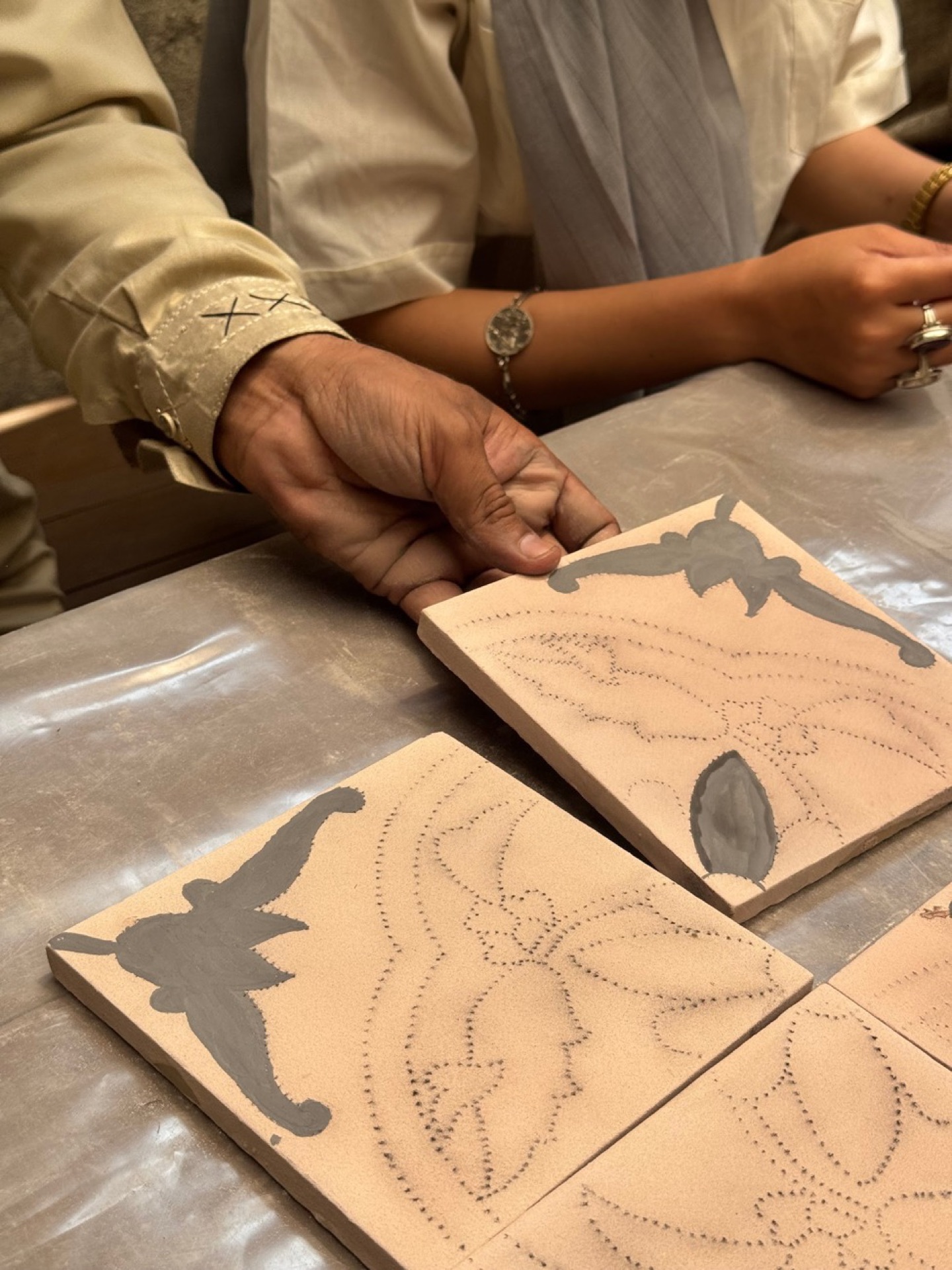 Kashi Kari tile assembly: framing, plastering, reinforcing, and flipping.
