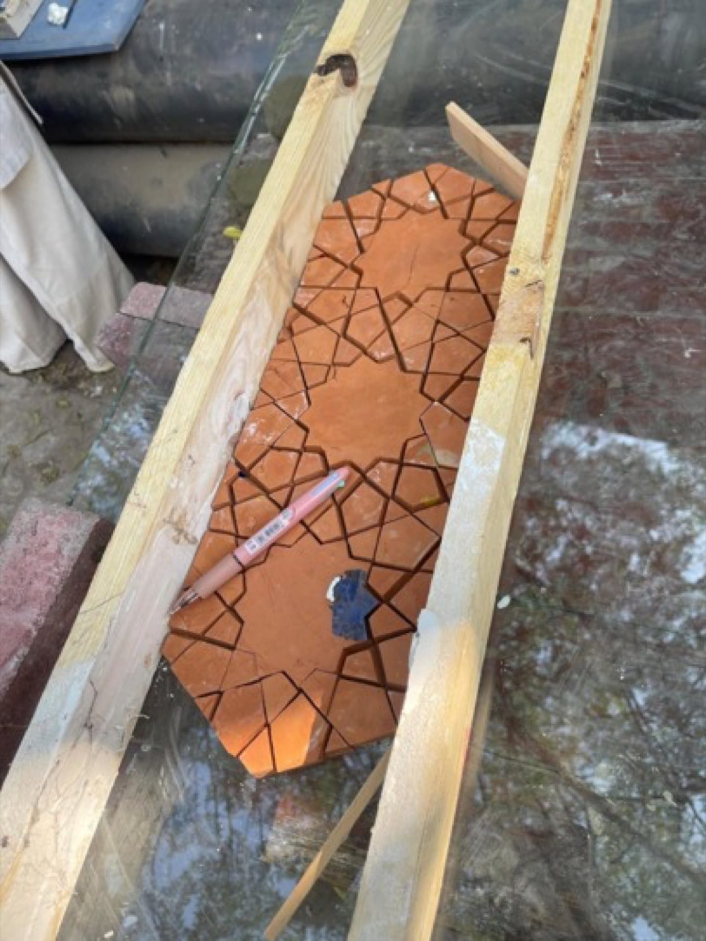 Kashi Kari tile assembly: framing, plastering, reinforcing, and flipping.