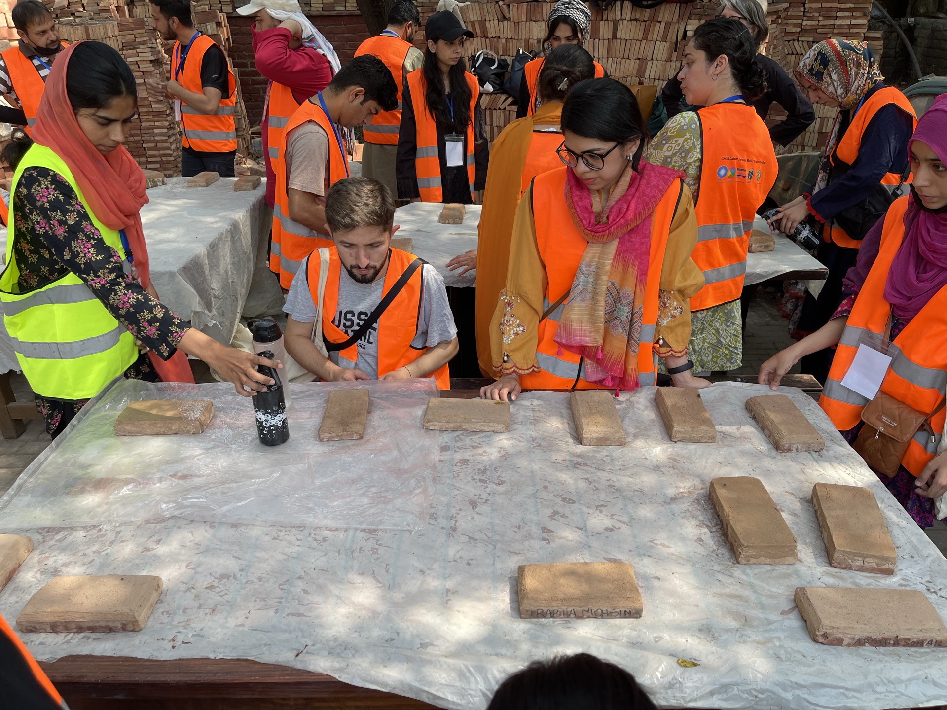 Hands-on lime practice with Lime Expert Ms. Catherine Woolfitt: mixing mortars, repointing, and casting lime slabs.