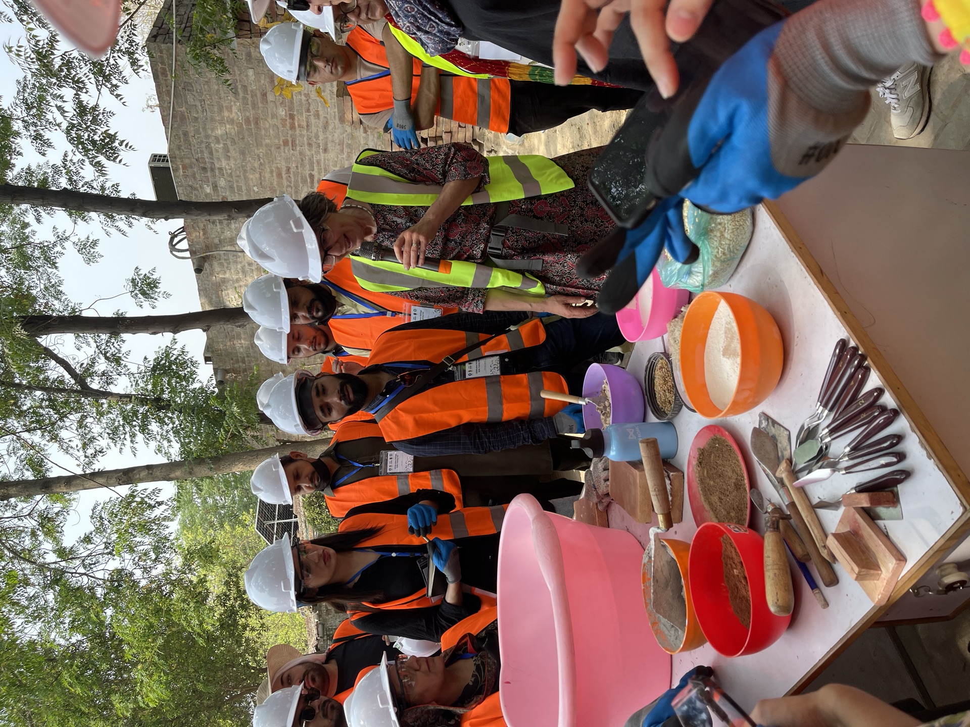Hands-on lime practice with Lime Expert Ms. Catherine Woolfitt: mixing mortars, repointing, and casting lime slabs.